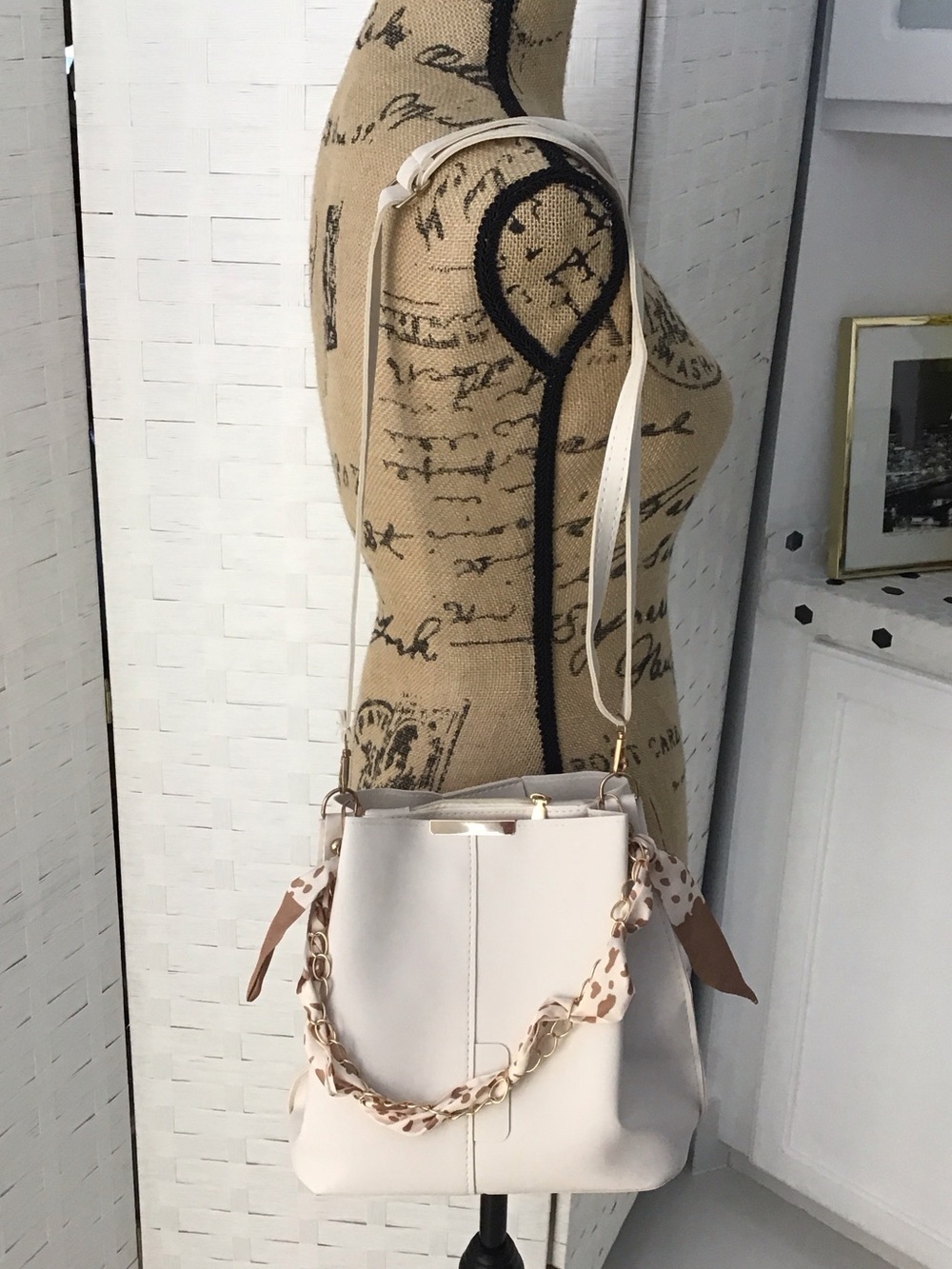 Cream Shoulder Bag with Scarf Accent. ##